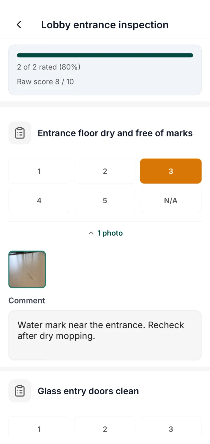 CleanLog mobile inspection showing an 80 percent score, a floor photo, and a follow-up comment